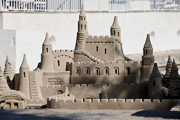 Image showing creative big sandcastle on the beauch in summer