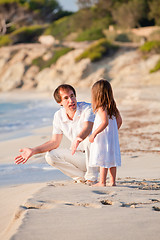 Image showing happy family father and daughter on beach having fun