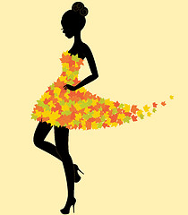 Image showing Dancer girl in dress of autumn leaves