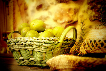 Image showing basket of figs and straw hat