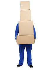 Image showing Guy overloaded with pile of cartons