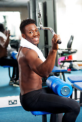 Image showing Fit guy working out in gym