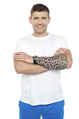 Image showing Masculine chap with massive tattoos