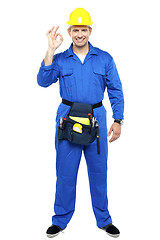 Image showing Keep up the good work. Repairman gesturing