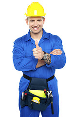 Image showing Young industrial contractor showing thumbs up