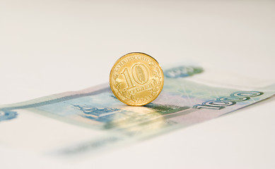 Image showing Coin on the banknote