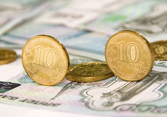 Image showing Some coins on banknotes