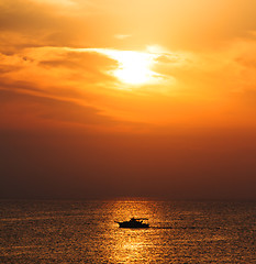 Image showing Silhouette Boat on sunrise