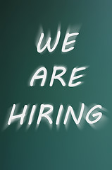 Image showing We are hiring - written on a green chalkboard background