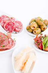 Image showing deliscious antipasti plate with parma parmesan and olives