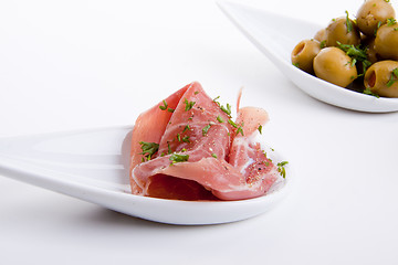 Image showing deliscious antipasti plate with parma parmesan and olives