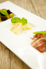 Image showing deliscious antipasti plate with parma parmesan olives 