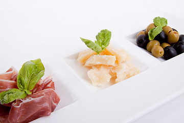 Image showing deliscious antipasti plate with parma parmesan and olives