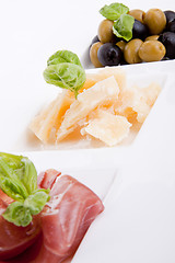 Image showing deliscious antipasti plate with parma parmesan and olives