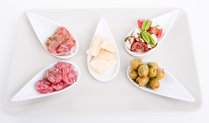 Image showing deliscious antipasti plate with parma parmesan and olives