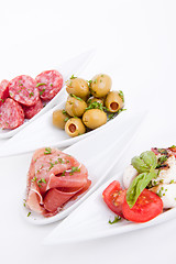 Image showing deliscious antipasti plate with parma parmesan and olives