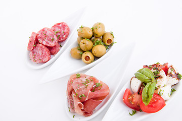 Image showing deliscious antipasti plate with parma parmesan and olives