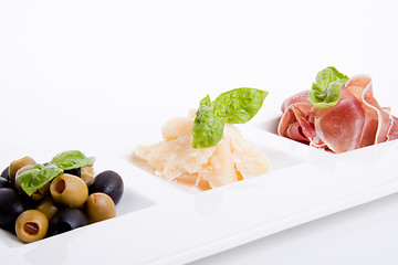 Image showing deliscious antipasti plate with parma parmesan and olives