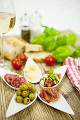 Image showing deliscious antipasti plate with parma parmesan olives 