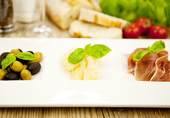 Image showing deliscious antipasti plate with parma parmesan olives 