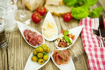 Image showing deliscious antipasti plate with parma parmesan olives 