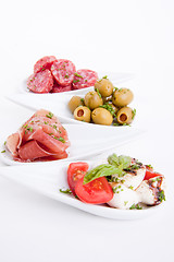 Image showing deliscious antipasti plate with parma parmesan and olives