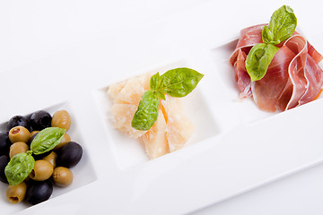 Image showing deliscious antipasti plate with parma parmesan and olives