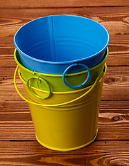 Image showing Colour Tin Buckets