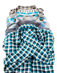 Image showing Stack of Plaid Long Sleeved Men's Shirts 