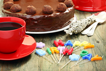 Image showing Birthday cake and candles in the form of congratulations.