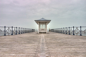 Image showing The old lighthouse on the pier