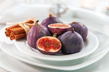 Image showing Fresh figs with cinnamon for Christmas table