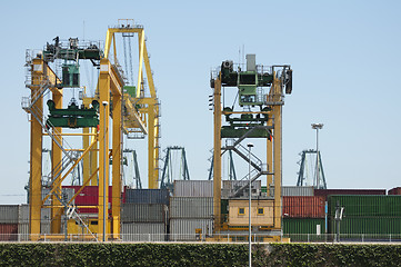 Image showing Working crane bridge in shipyard at dusk for Logistic Import Exp