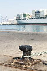 Image showing Ship moored to pier, view from the bollard