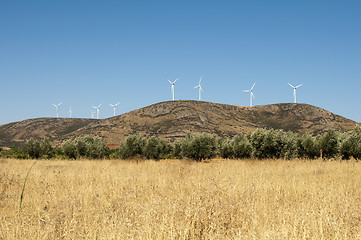 Image showing Wind generators on the top of the mountain
