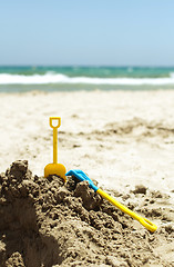 Image showing Toys in the sand