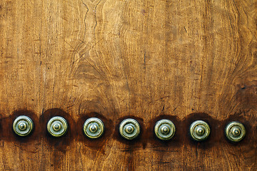 Image showing Ornaments on a wooden door