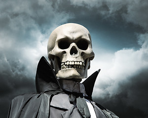 Image showing grim reaper. death's skeleton on a cloudy dramatic sky