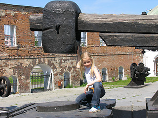 Image showing Girl under large hammer
