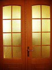 Image showing Beautiful wooden door with glasses