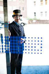 Image showing Hotel doorman at your service