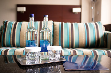 Image showing Hotel room shot. Beverage bottles in focus