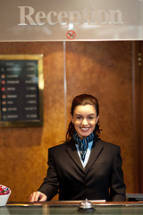 Image showing Charming pretty receptionist posing