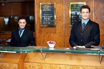 Image showing Front desk colleagues posing for a picture