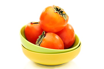 Image showing Ripe persimmons in a bowl.