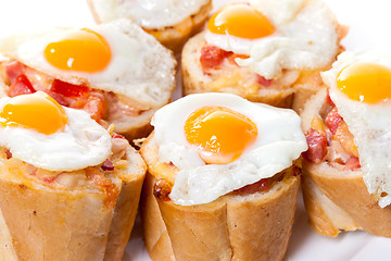 Image showing Baguette Slice with Ham and Fried Quail Egg