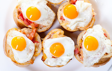 Image showing Baguette Slice with Ham and Fried Quail Egg