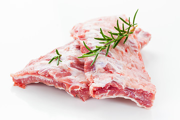 Image showing Raw spare ribs with rosemary