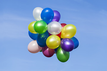 Image showing Different coloured balloons in the sky