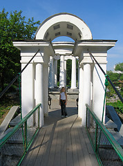 Image showing Little girl on the bridge to rotunda